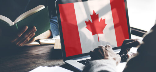 A laptop programmer prepares to work in Canada with the possibility of relocation